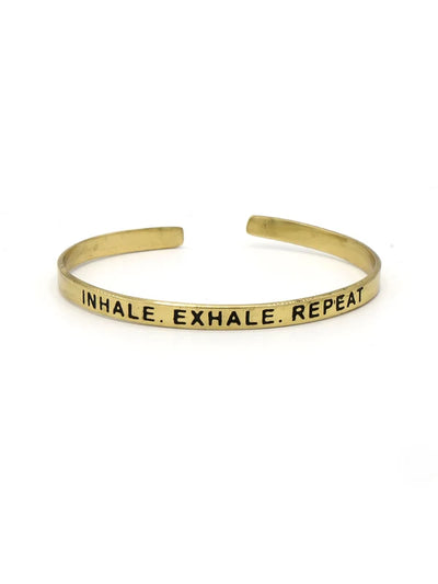 Fair Anita Breathe Cuff in brass, stamped Inhale. Exhale. Repeat.