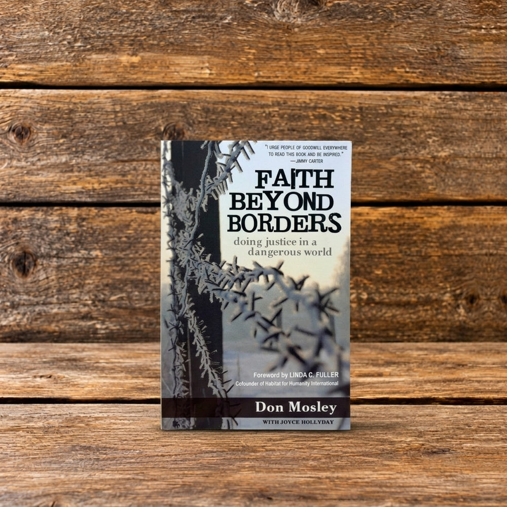 Front cover of Faith Beyond Borders: Doing Justice in a Dangerous World by Don Mosley with Joyce Hollyday, featuring barbed wire against a pale background, photographed on a rustic wooden surface.