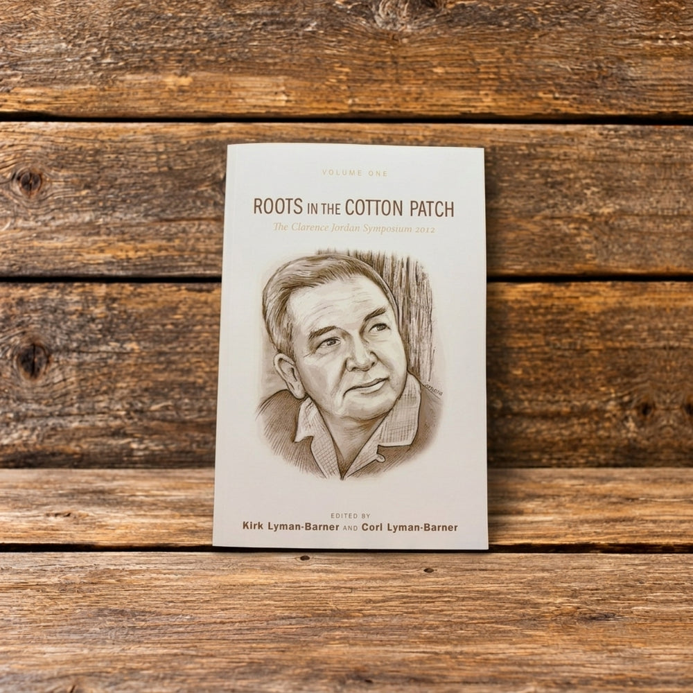 Front cover of Roots of the Cotton Patch, Volume 1, displayed against a rustic wooden background.