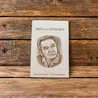 Front cover of Roots of the Cotton Patch, Volume 1, displayed against a rustic wooden background.